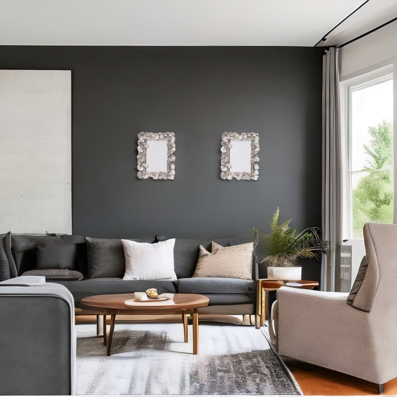 Laura Silver Photo Frame hung in living room with gray walls and grey furniture.