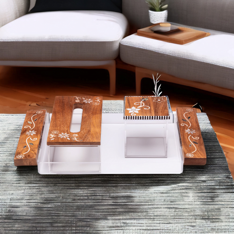 Premium Acrylic and Wood tray adorned with quality mother of pearl inlay, set consists of tray, tissue box and storage box styled with artistic flower pattern sitting on living room table.