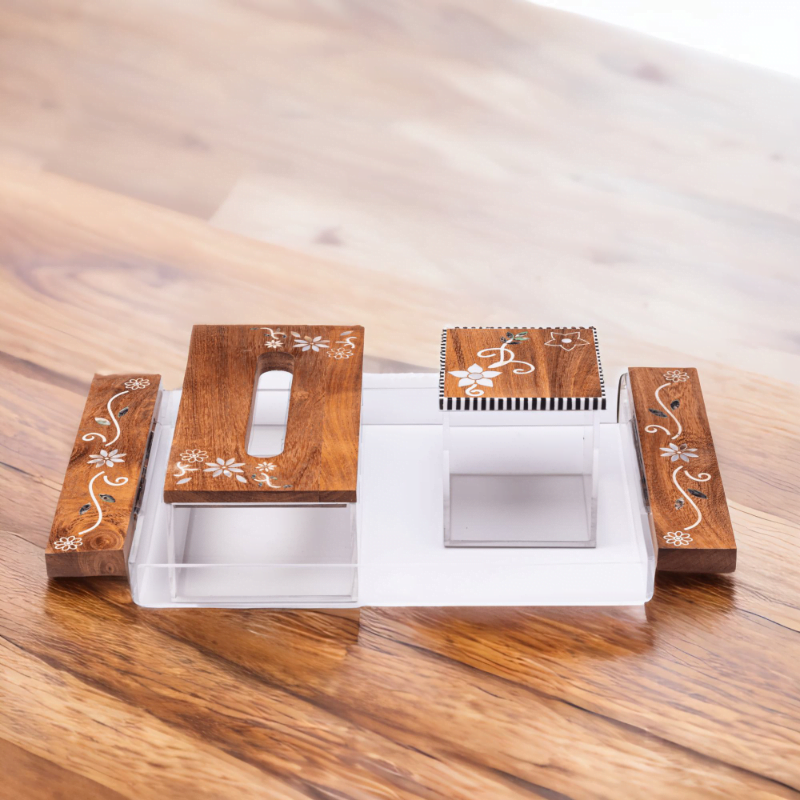 Premium Acrylic and Wood tray adorned with quality mother of pearl inlay, set consists of tray, tissue box and storage box styled with artistic flower pattern sitting on a wooden top.