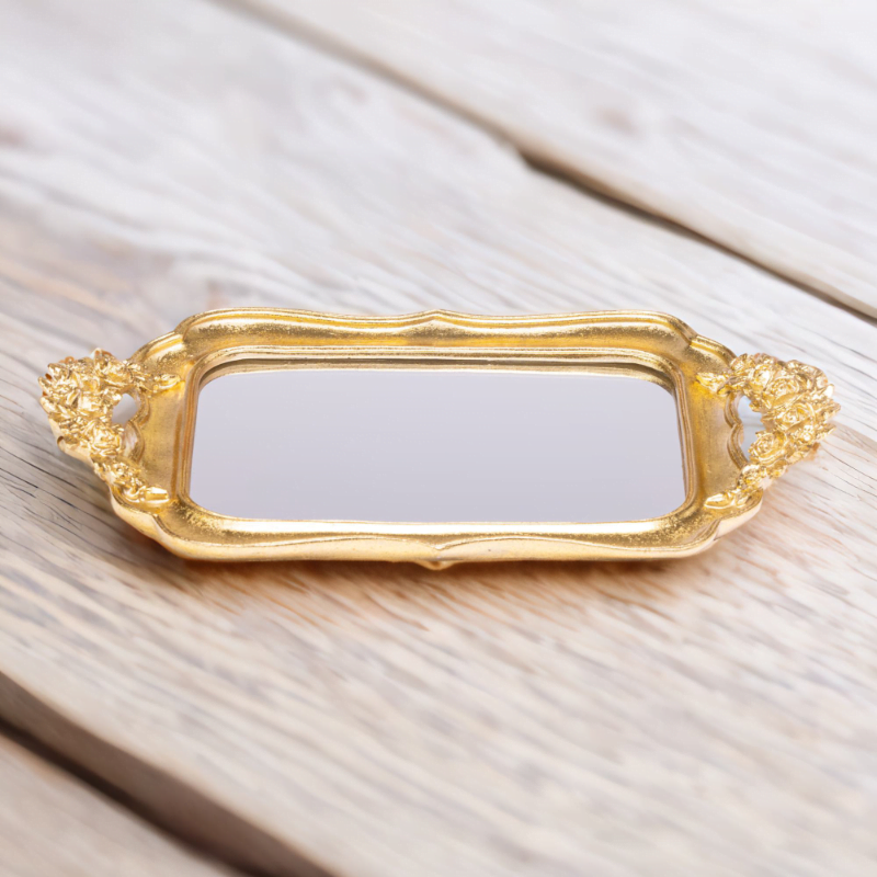 A Fancy Tray on a wooden table.
