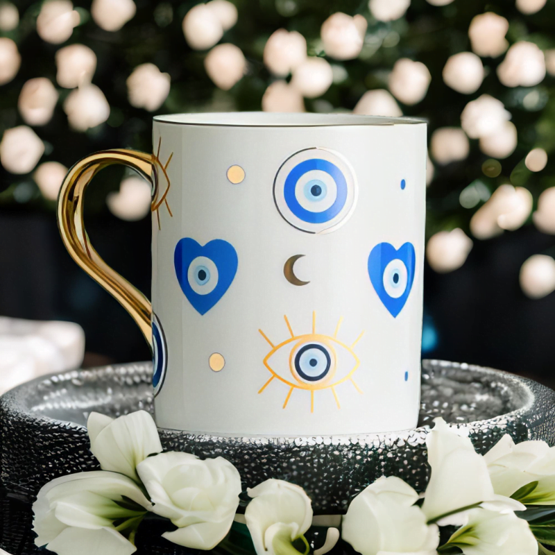 An Azure Heart Mug with an evil eye on it.