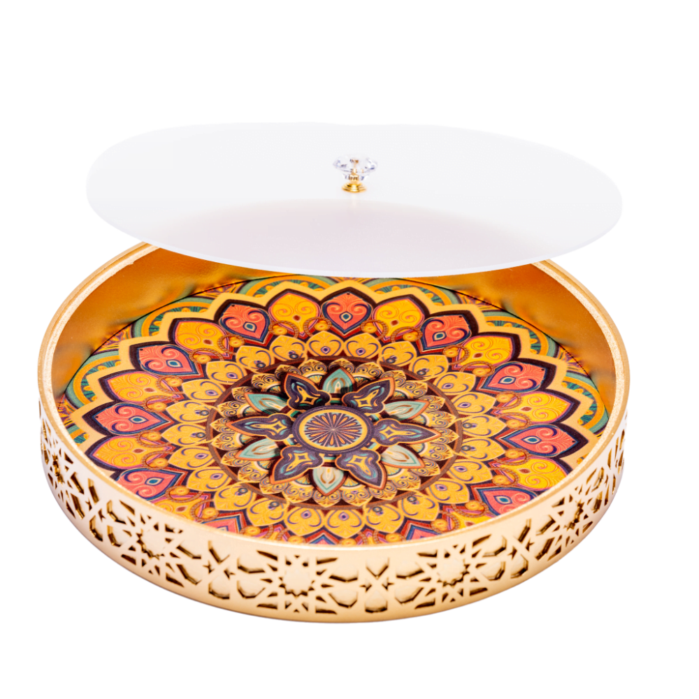 A vibrant gold decorative tray with an intricate and colourful design with frosted lid.