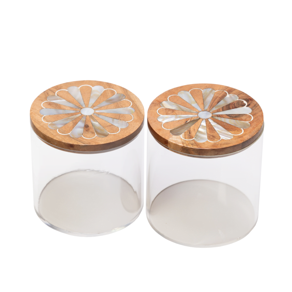 two acrylic and wood canisters with mother of pearl inlay.