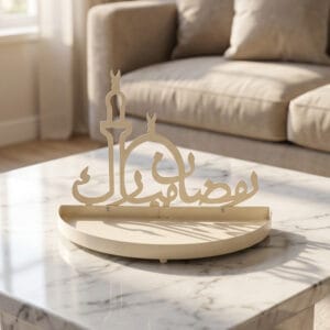 Soft cream metal crescent moon tray with decorative Arabic Ramadan Mubarak calligraphy and minaret silhouette backpiece